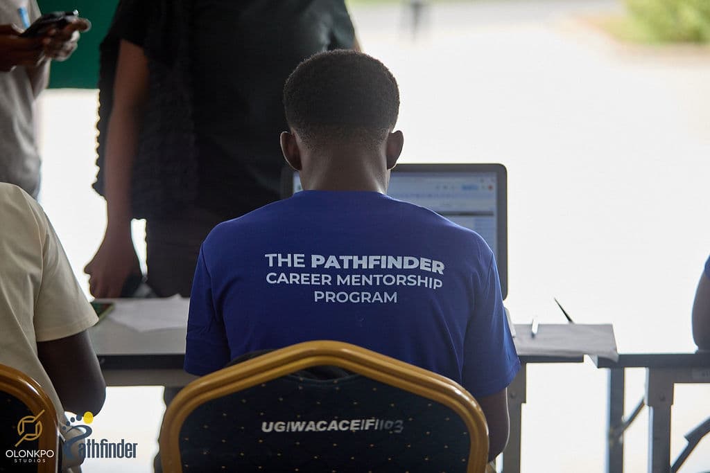 Young professionals collaborating with laptops